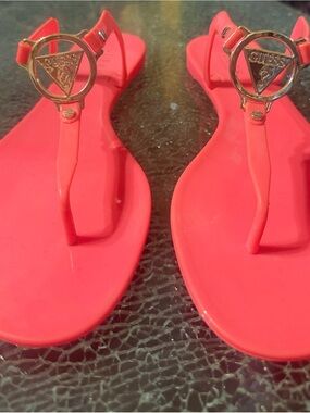 GUESS Coral Pink Jelly T-Strap Sandals with Gold Logo
